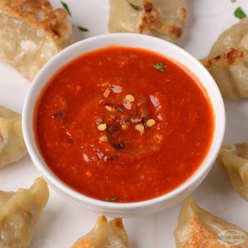 Momos chutney or tomato chilli garlic sauce.