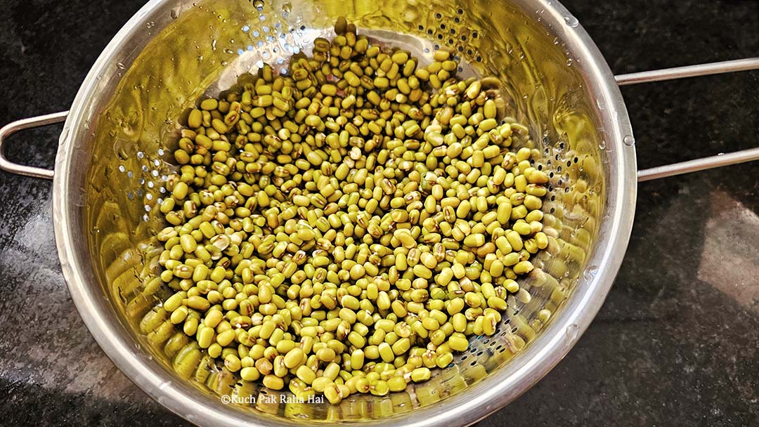 Draining water in which moong dal was soaked.