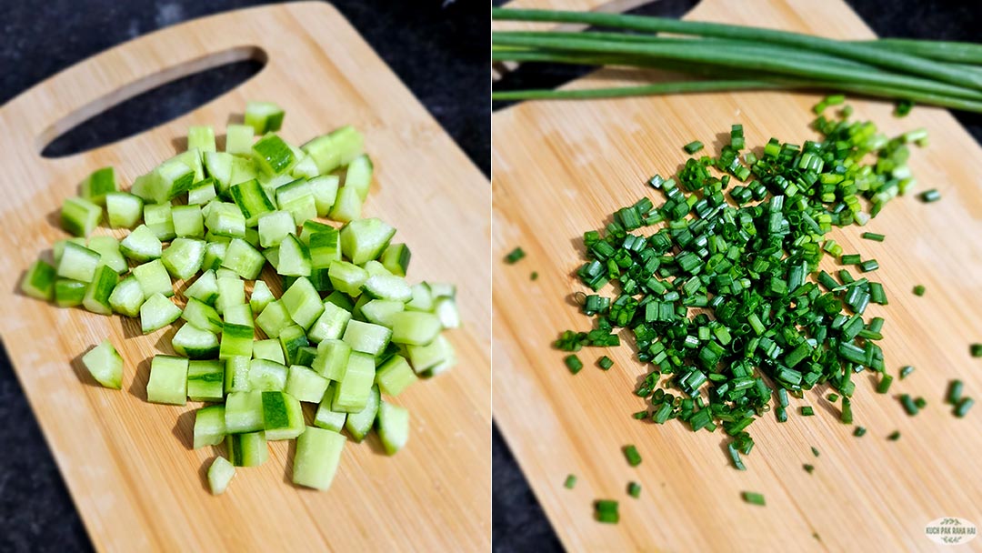 Chopping cucumbers and herbs.