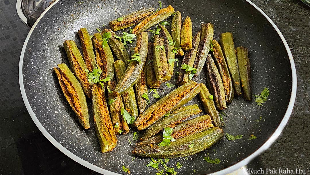 Stuffed bhindi garnished with cilantro.