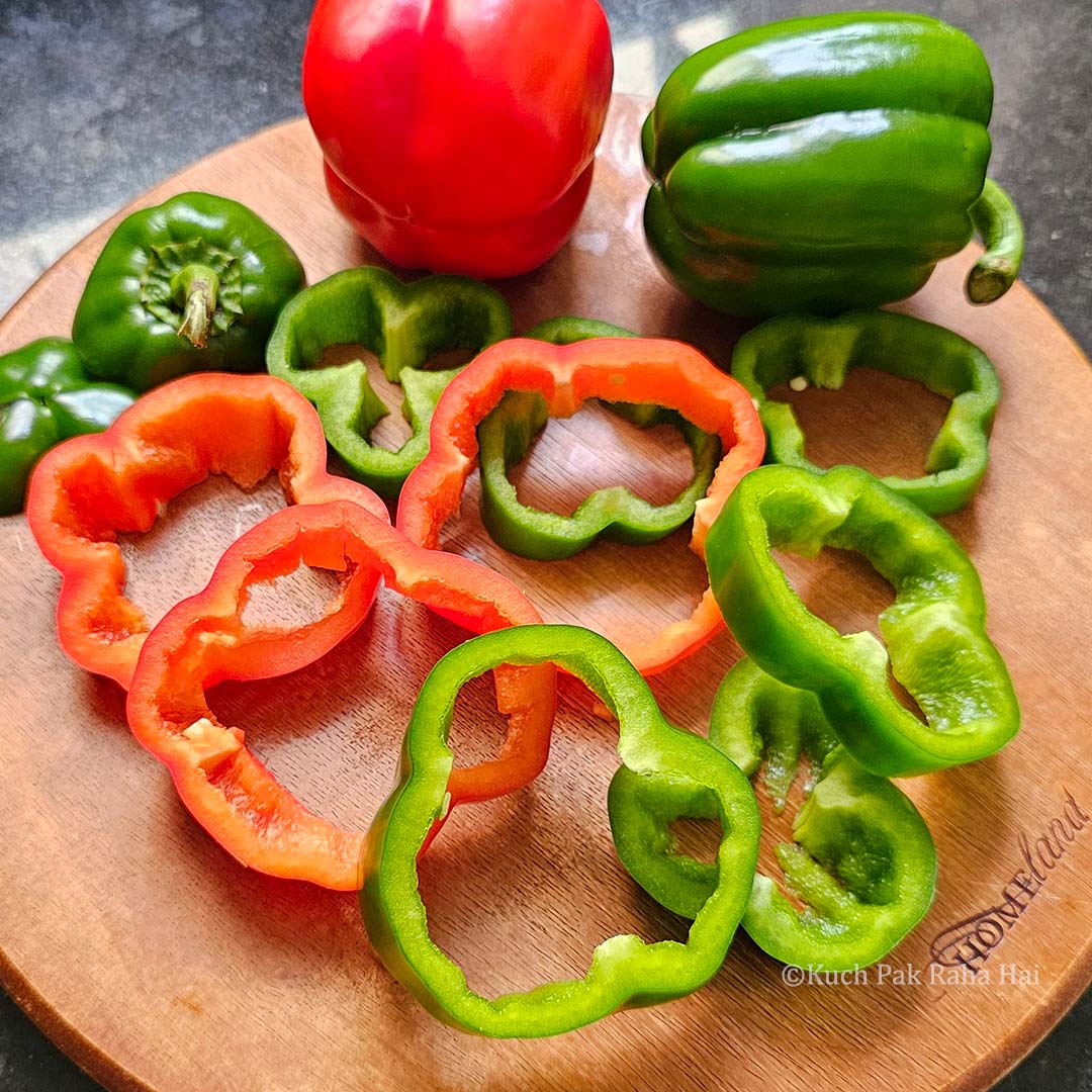 Cutting capsicum into rings.