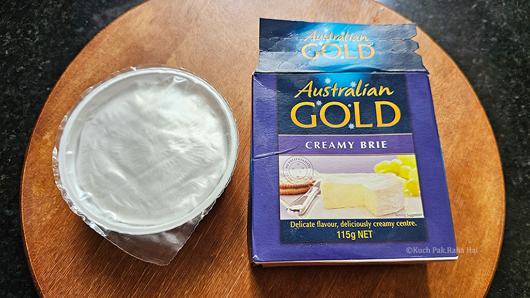 Australian gold creamy brie cheese wheel.