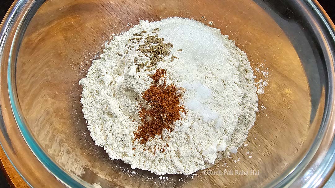 Mixing flour with spices.