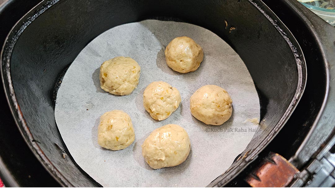 Making balls from the donut dough.