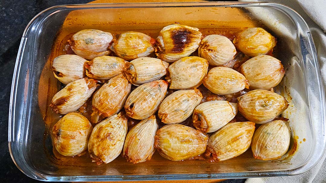 Baked stuffed onions straight out of oven.