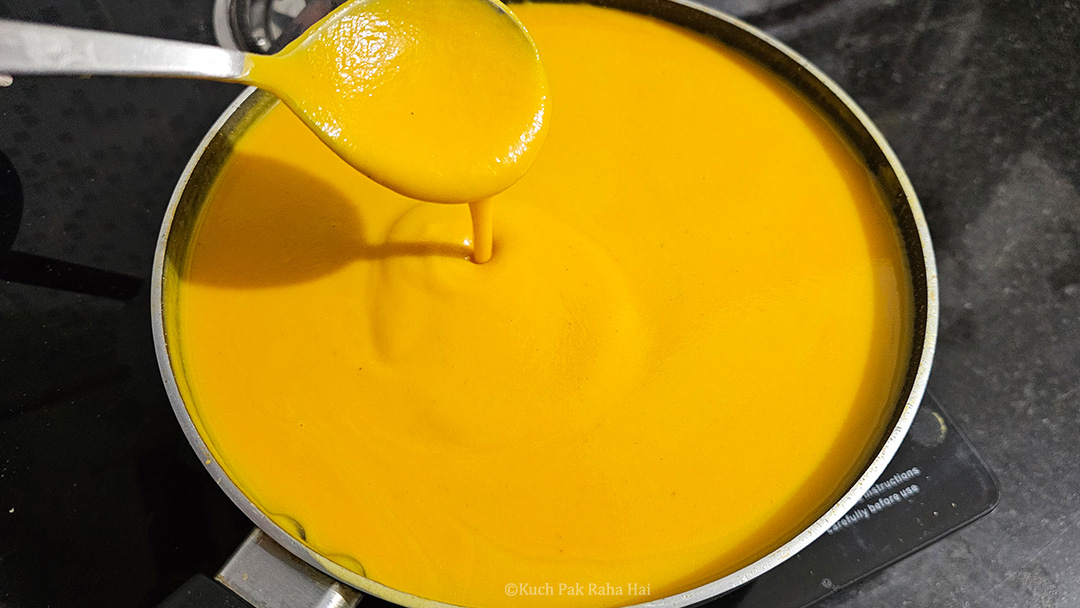 Blending the soup in blender jar.